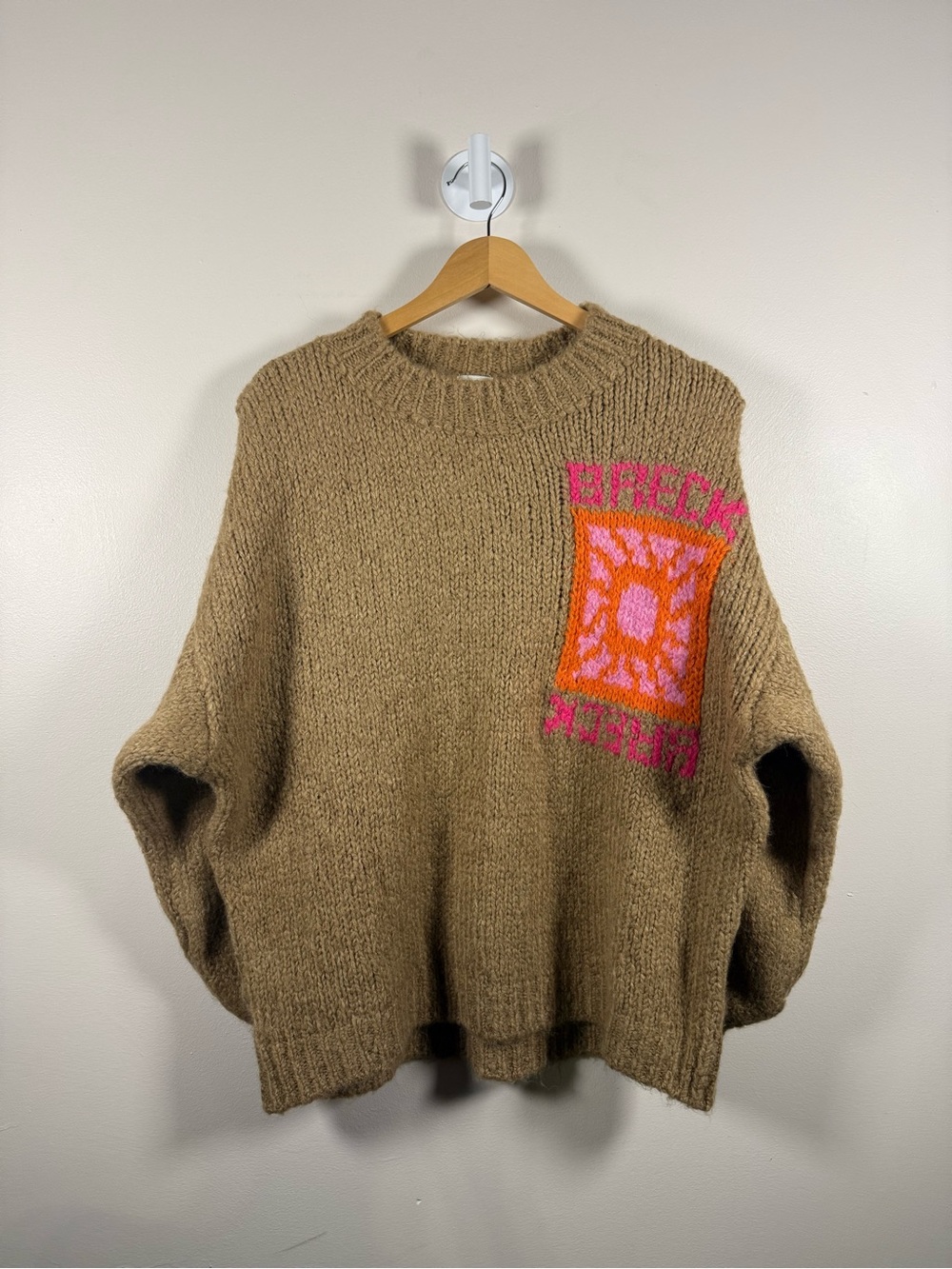 Beige Crewneck Sweater with Pink and Orange Graphic Patch